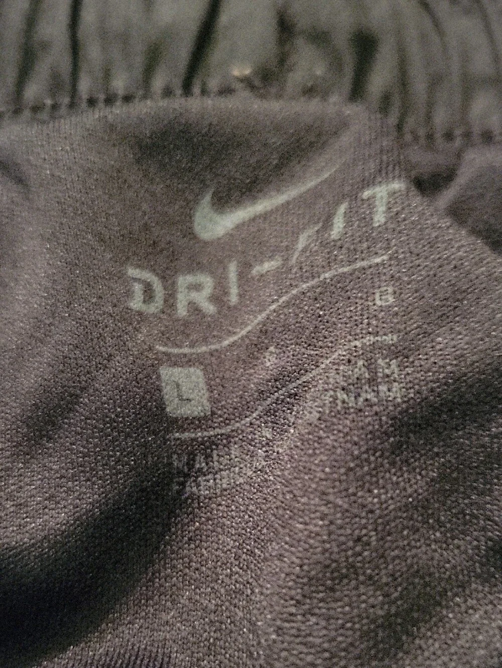 Nike Women’s Black Athletic Shorts with White Swoosh